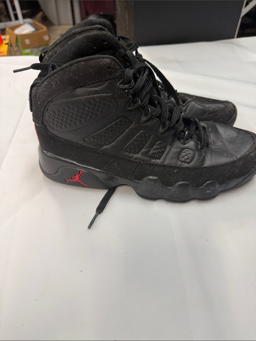 Jordan Black High-Top Sneakers with Red Jumpman Accent